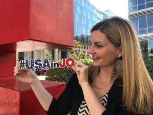 Kala Carruthers Azar with the hashtag of the U.S. Embassy in Jordan: #USAinJo.