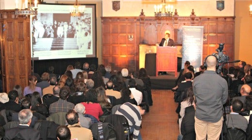 Man giving a presentation in front of an audience