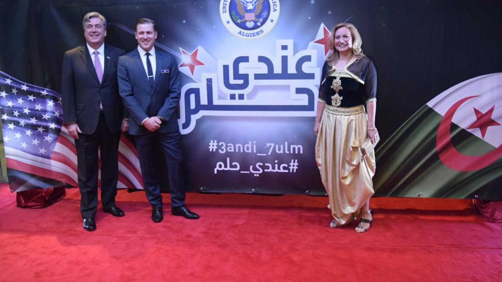 Georgetown alums U.S. Ambassador John P. Desrocher and Andrew Farrand with Karen Rose