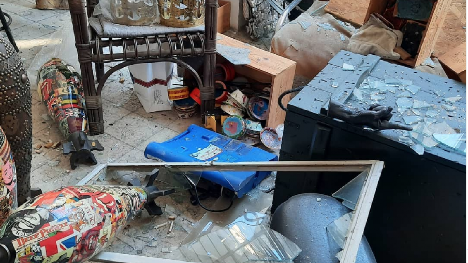 image of an art studio damaged by an explosion