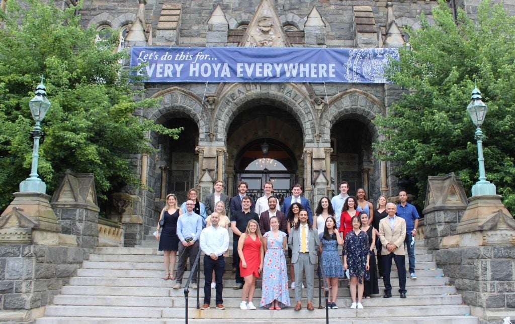 Students and faculty on the steps of Healy Hall