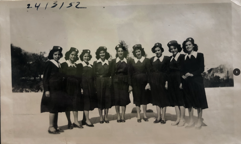 Old picture of students from Najwa (center) posing for their graduation from Al-Ayesheya Public High School in 1952