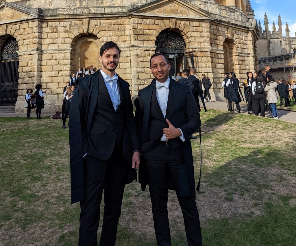 Photo of Motasem Abuzaid and Azim Wazeer on the campus of Oxford University. 