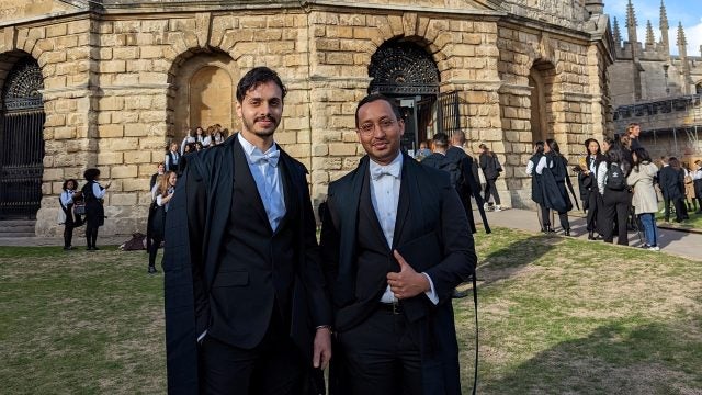 Photo of Motasem Abuzaid and Azim Wazeer on the campus of Oxford University.