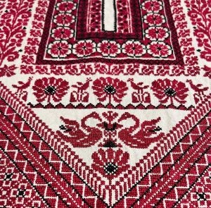 Image of red and white embroidery