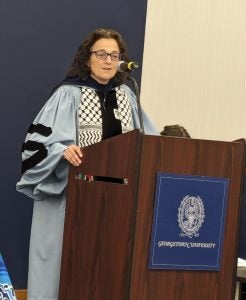 Prof. Fida Adely at podium