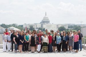 Teacher in front of US Capitol