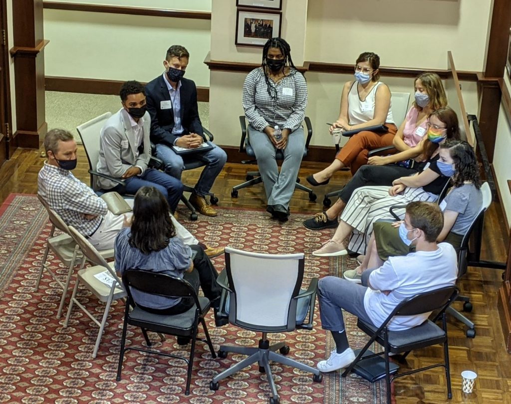 students gathered during orientation small group break outs
