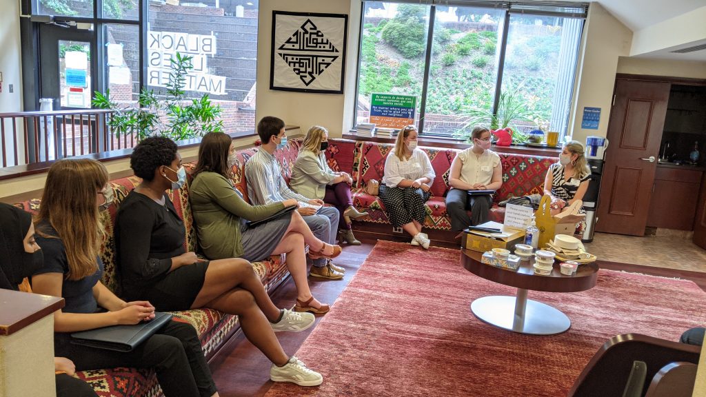 students gathered during orientation small group break outs