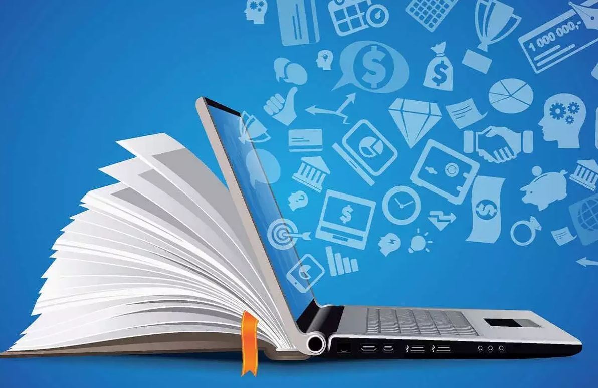 book and laptop with ideas coming out of it