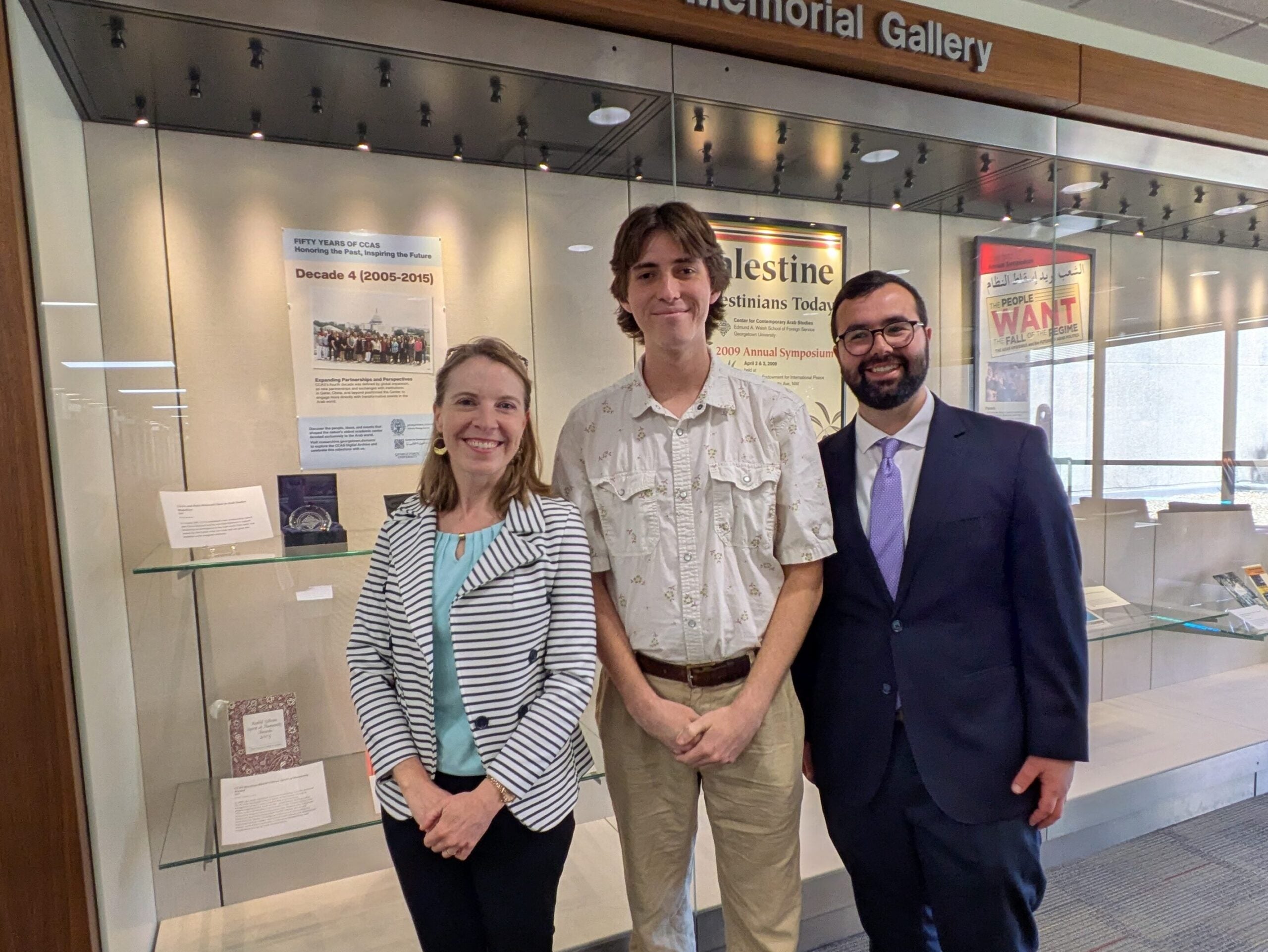 Curators Vicki Valosik, Jasper Hunsinger, and Ryan Zohar at the launch of Lauinger's exhibit celebrating 50 years of CCAS